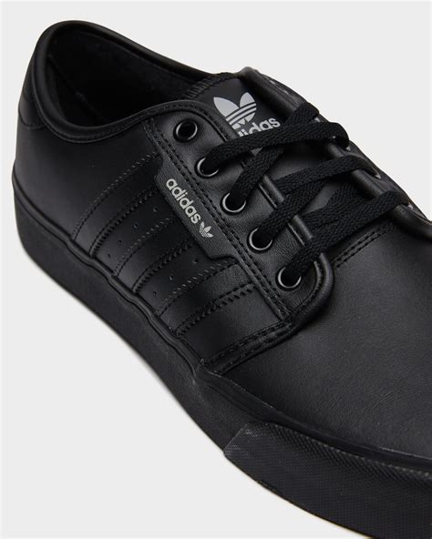 adidas black leather shoes|solid black adidas shoes.